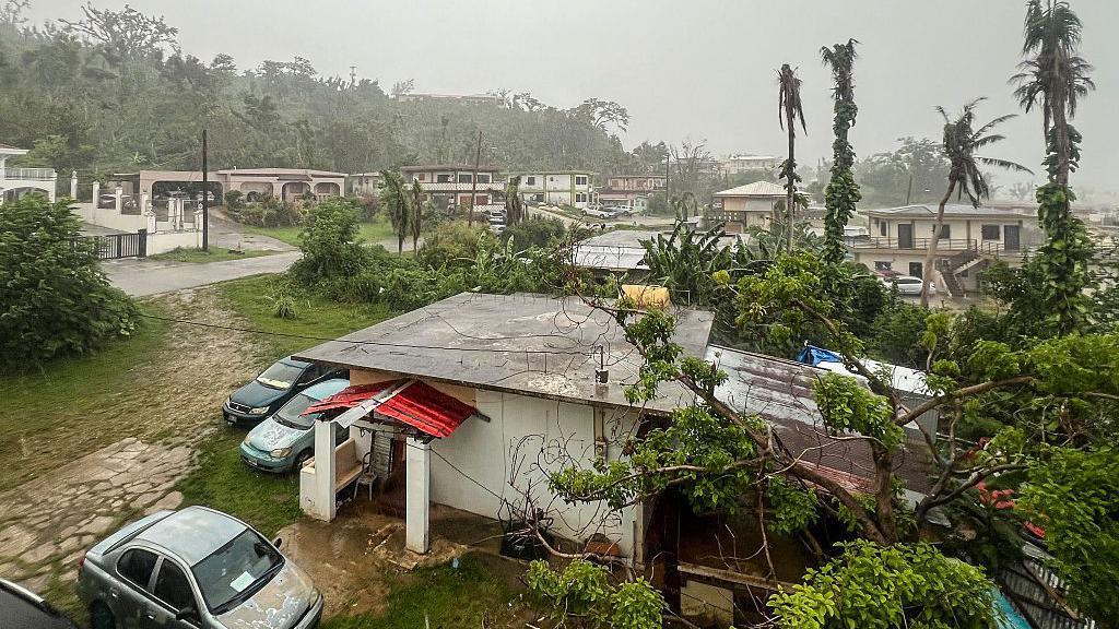 This picture shows a general view of a residential area as rain falls ahead of the arrival of the forecasted Super Typhoon Bavi in Saipan, Northern Mariana Islands, on July 5, 2026.