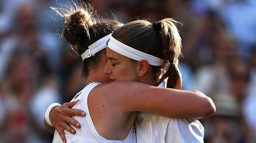 Linda Noskova and Karolina Muchova hug after their epic Wimbledon final