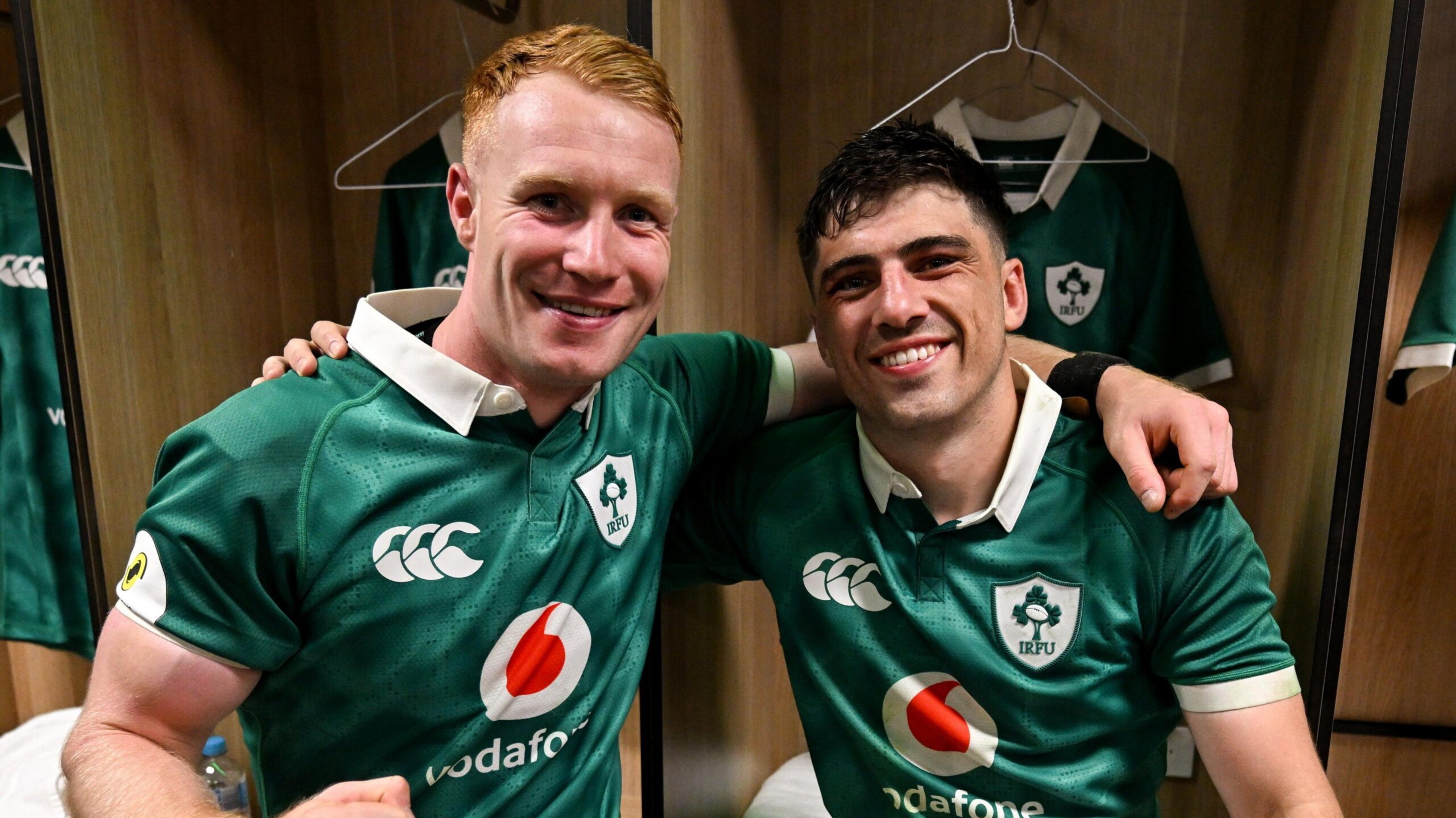 Ciaran Frawley and Jimmy O'Brien sit arm in arm in the Ireland dressing room