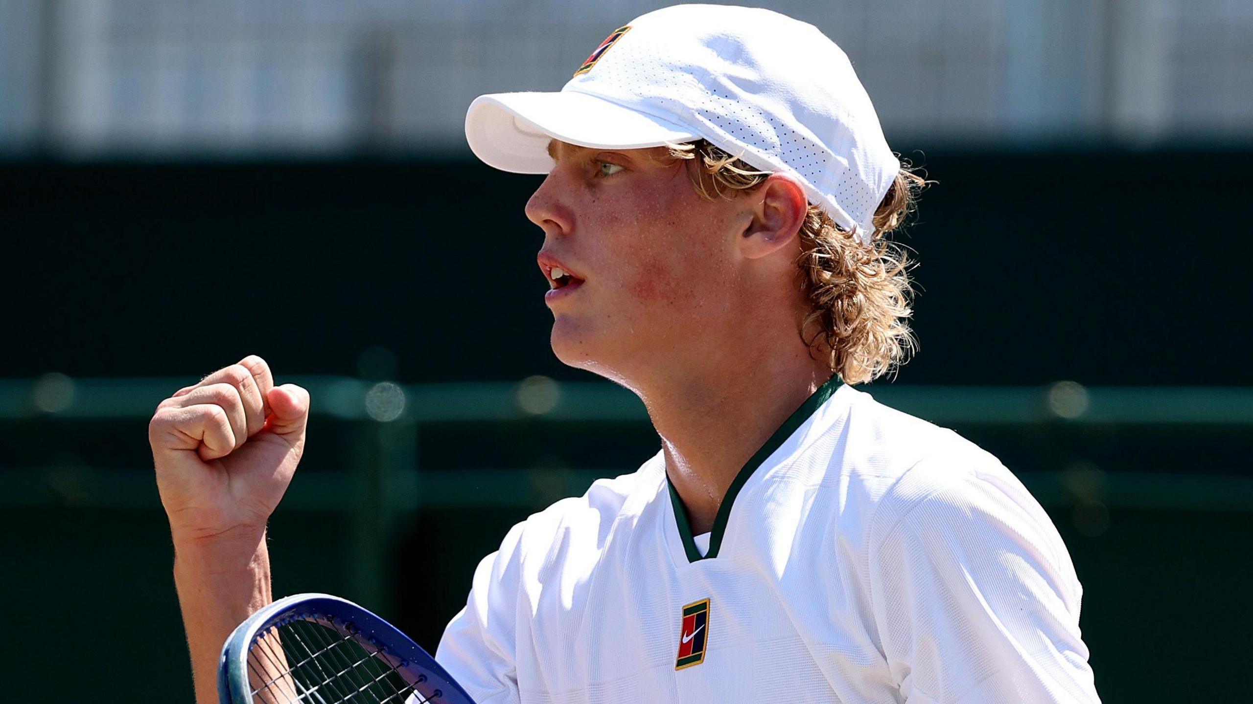 Cruz Hewitt celebrates after recording another win at Wimbledon