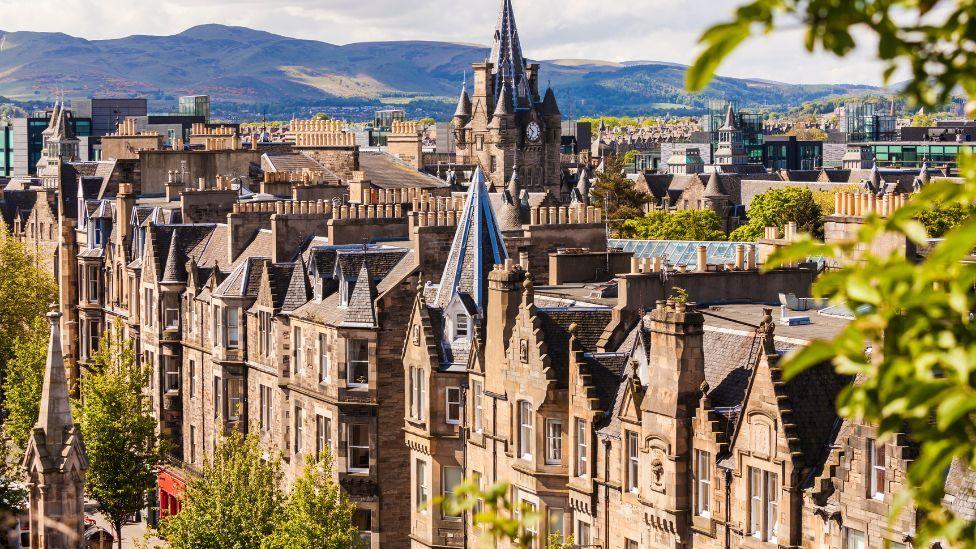A general view of large stone house in Edinburgh on a sunny day