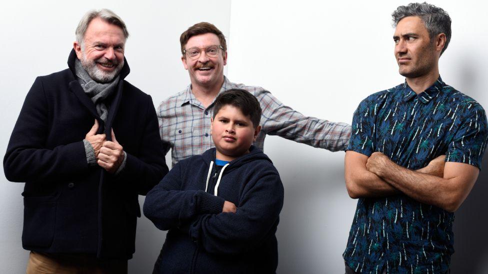 Actors Sam Neill, Rhys Darby, Julian Dennison and writer/director Taika Waititi from the film "Hunt for the Wilderpeople" pose for a portrait during the WireImage Portrait Studio hosted by Eddie Bauer at Village at The Lift on January 22, 2016 in Park City, Utah