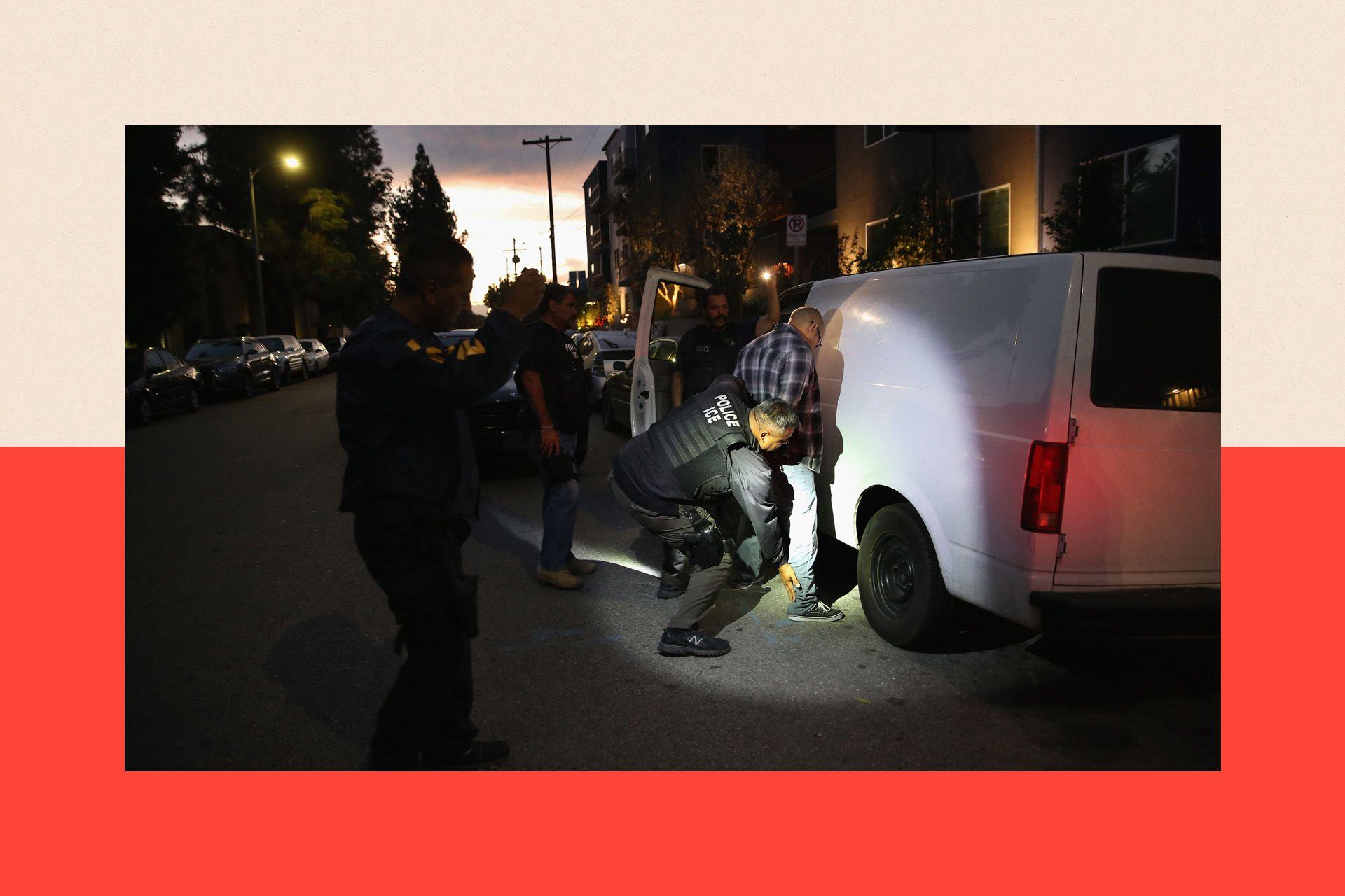 ICE officers search a man against the side of a white van