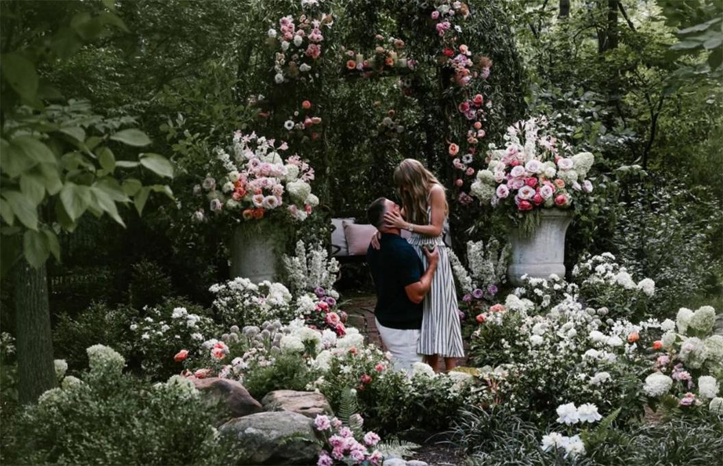 Taylor Swift and Travis Kelce in a floral background