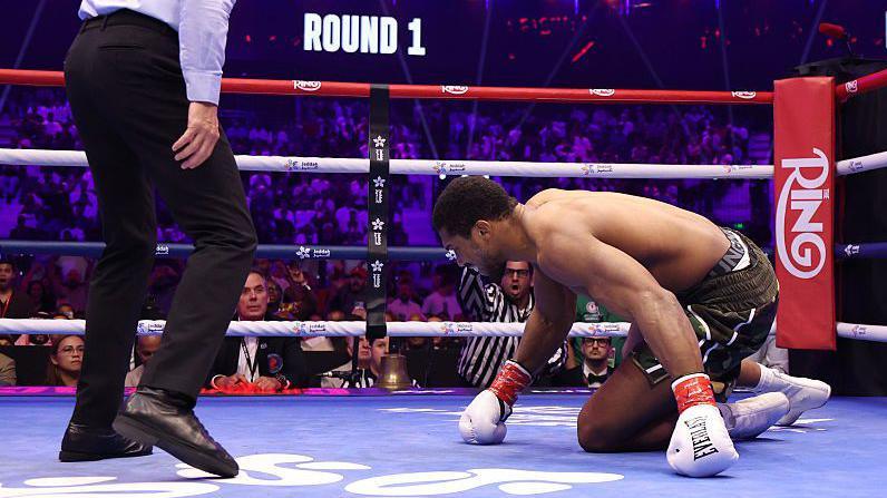 Anthony Joshua on the canvas