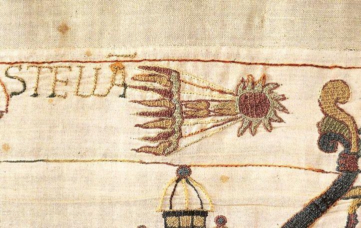 A closer crop shows the comet racing through the sky next to letters reading 'Stella' and fabric texture detail.