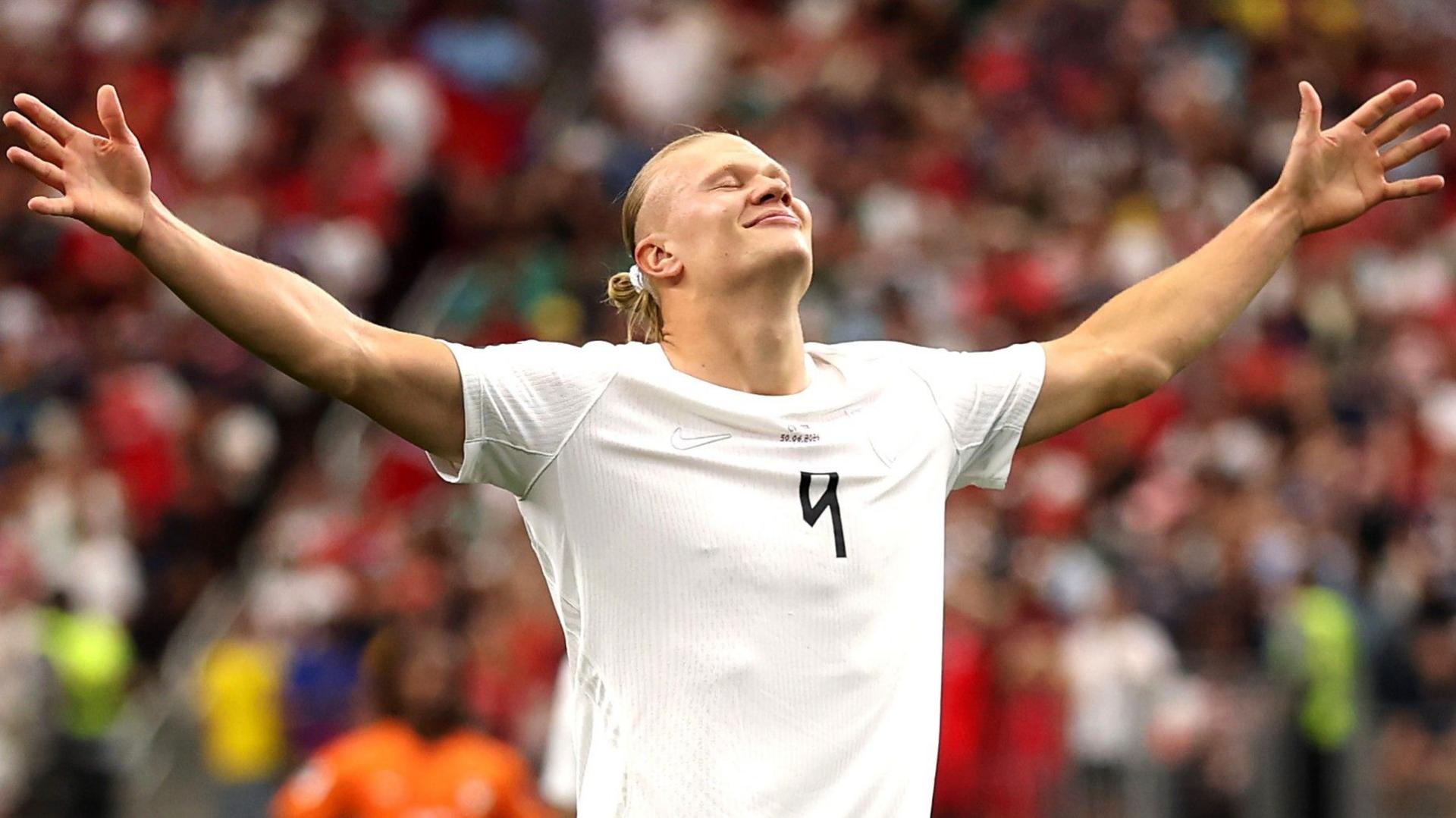 Erling Haaland celebrates scoring for Norway