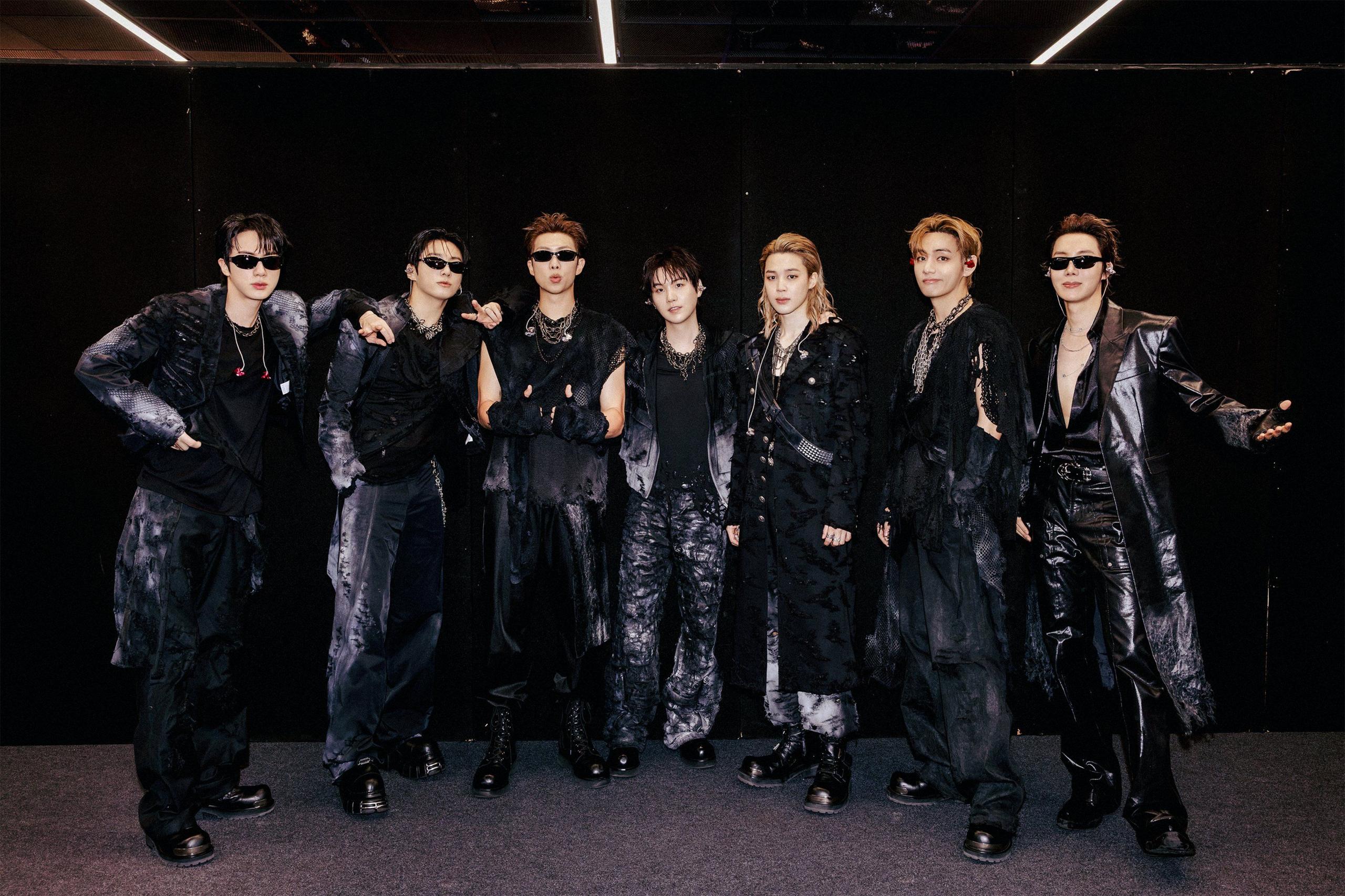 BTS backstage in London wearing black outfits