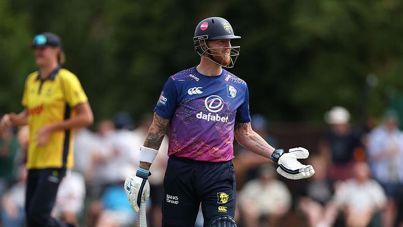 Ben Stokes holds his arms out in frustration after being dismissed.