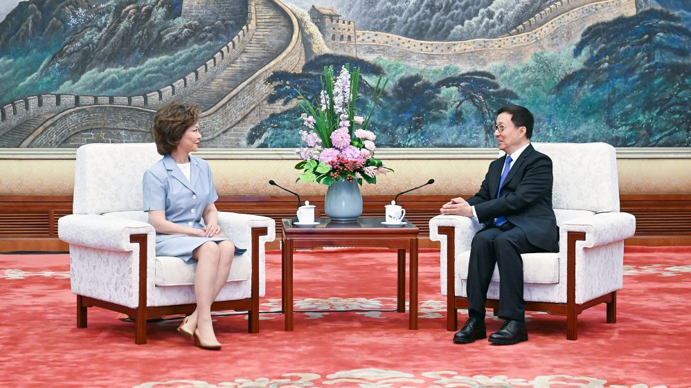 Chinese Vice President Han Zheng, right, meets with former U.S. Transportation Secretary Elaine Chao, left, in Beijing.