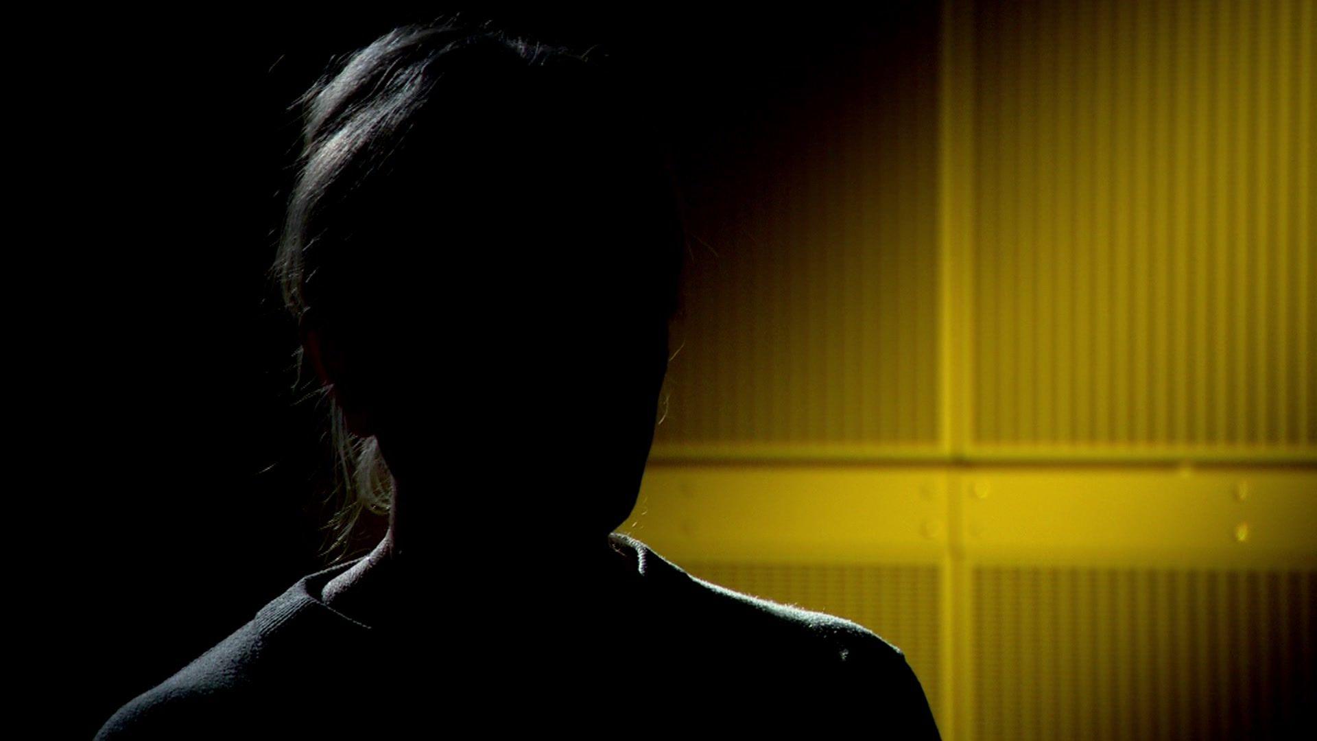 Lorraine is shown in silhouette as she cannot be identified