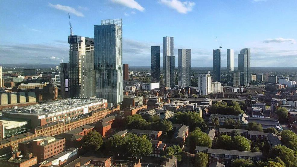 The Manchester skyline showing a number of modern tower blocks.