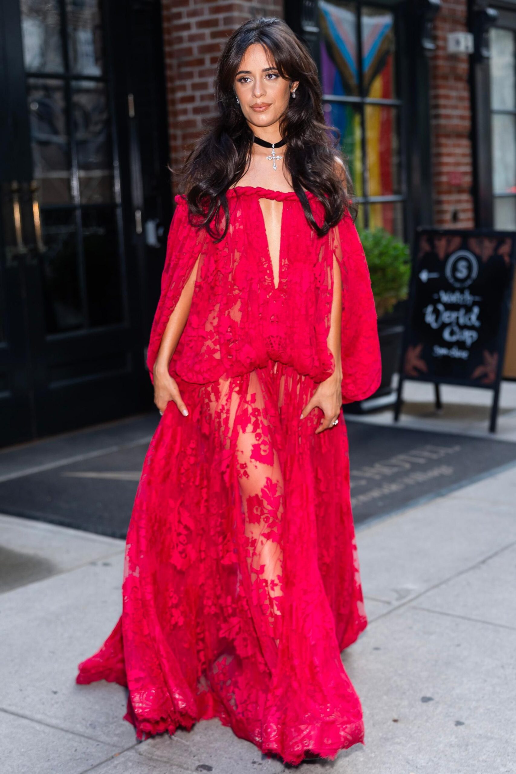 Camila Cabello in a long red dress