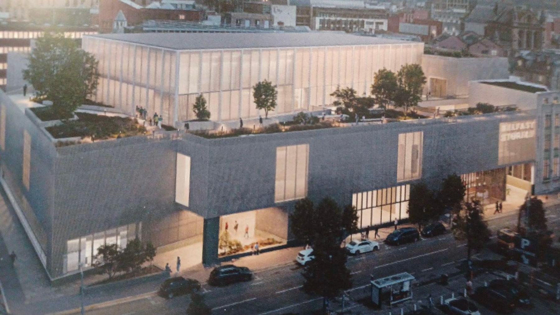 A computer-generated image of Belfast Stories. It shows an aerial view of the Belfast skyline, with a focus on a large, brown building with a garden on its roof.