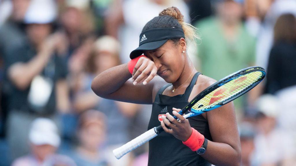 Naomi Osaka of Japan reacts to her win against Aryna Sabalenka of Belarus