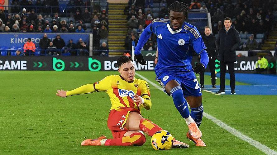 Jeremy Monga dribbles down the touchline, evading a tackle of Watford's Othmane Maamma