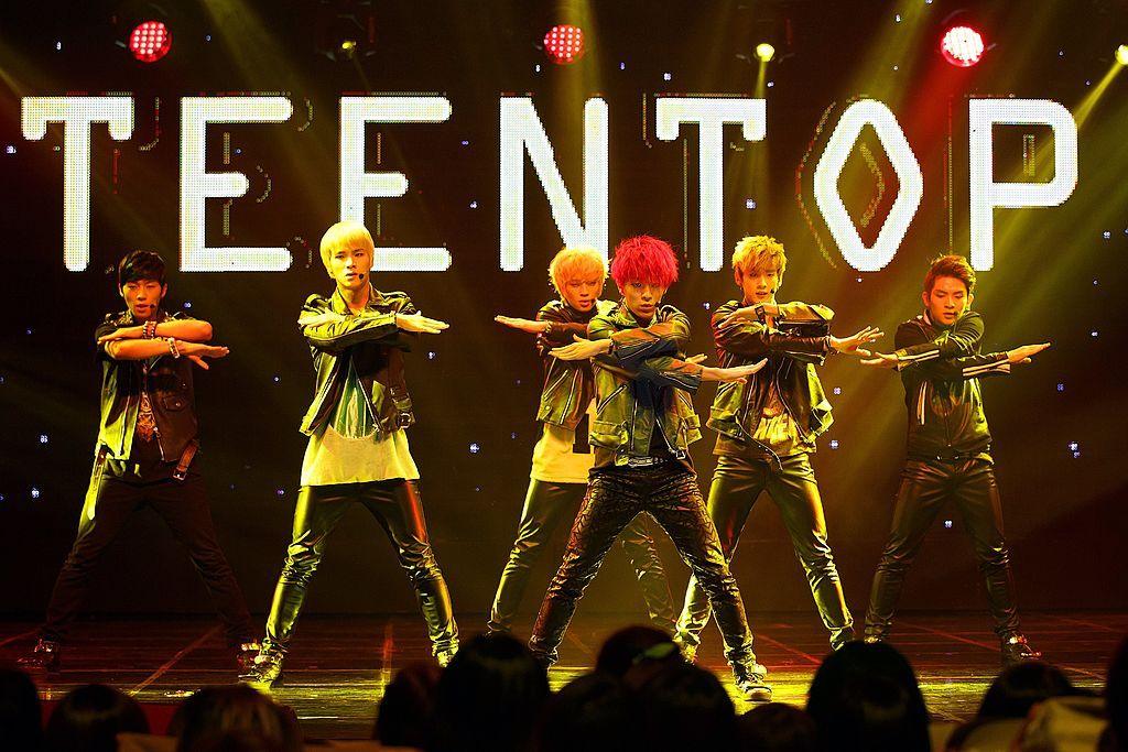 This photo taken on September 26, 2013 shows South Korean idol band "Teen Top" performing at Mnet Countdown in Seoul.