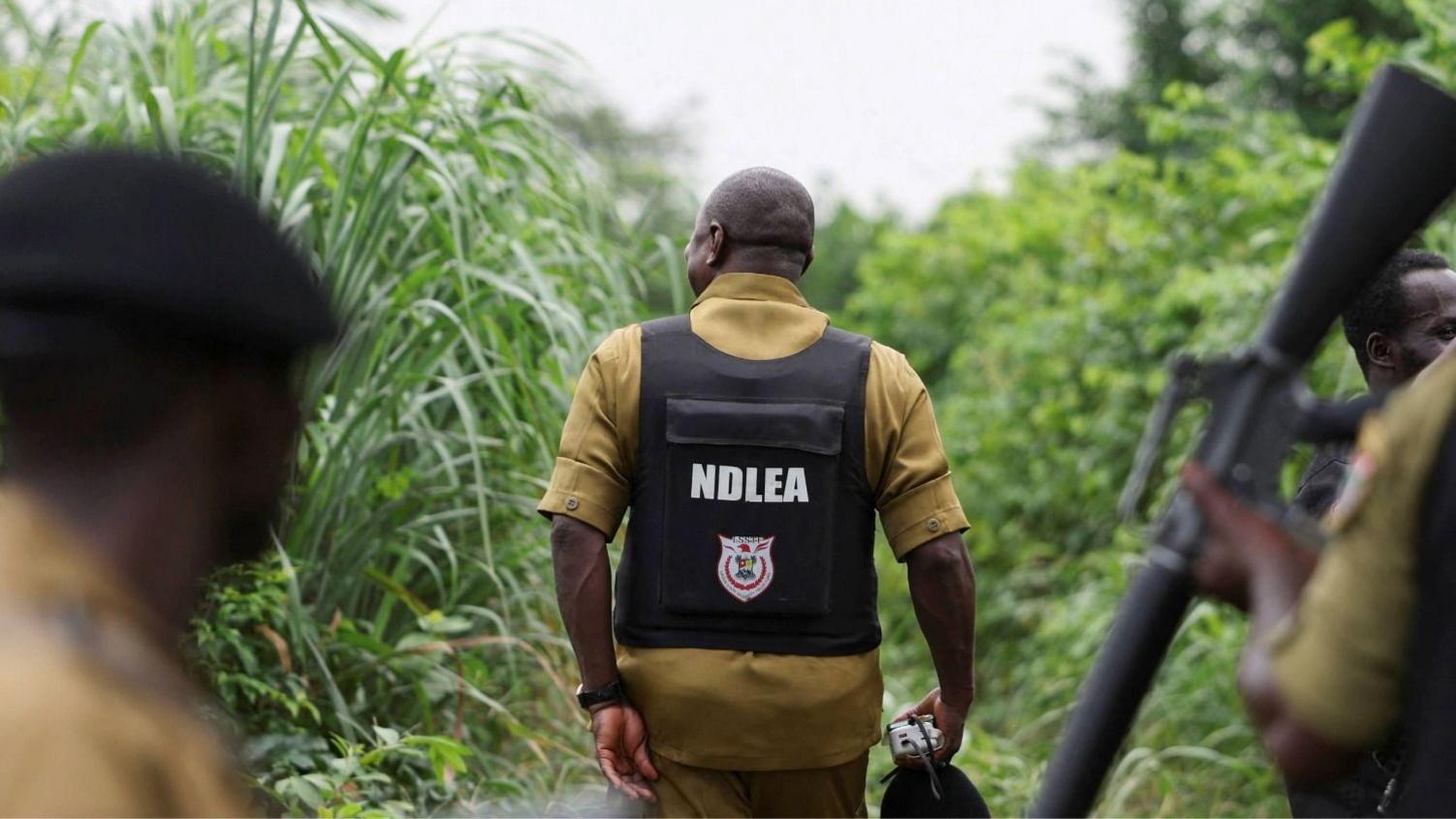 Anti drug officers inspect a site allegedly used as a clandestine methamphetamine laboratory - Ogun state, Nigeria - 22 July 2026.