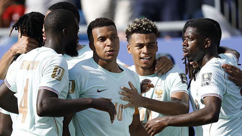 Kylian Mbappe celebrates with his France team mates