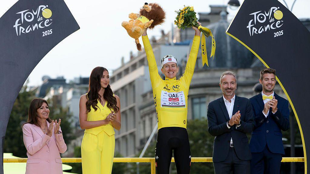 Tadej Pogacar in the yellow Tour de France winner's jersey