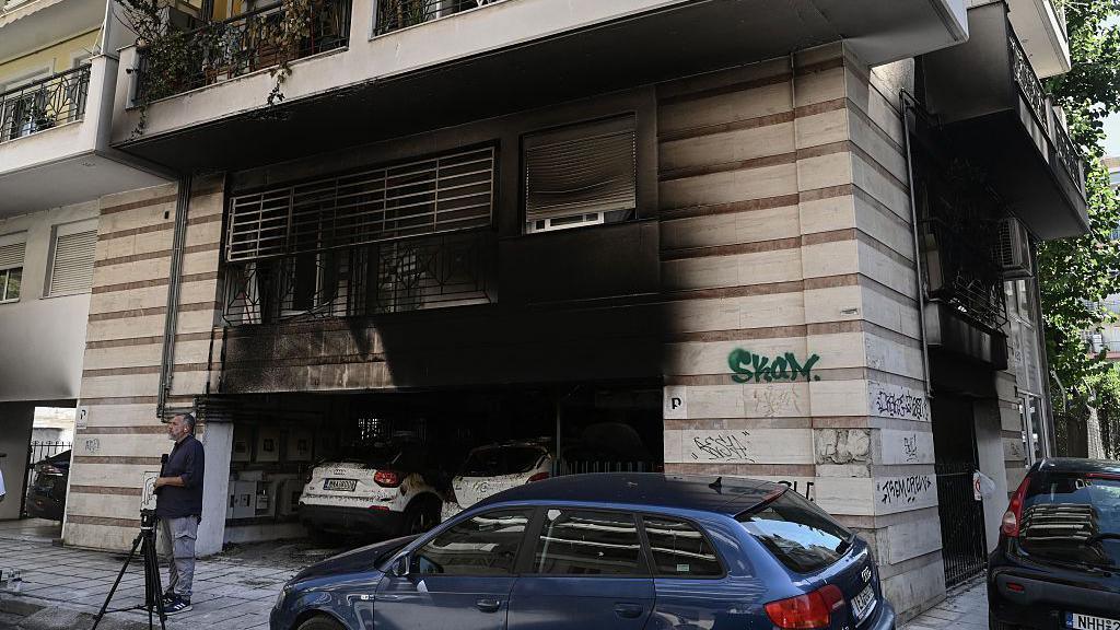 Greek politician’s mother dies of wounds after arson attack Greek politician’s mother dies of wounds after arson attack