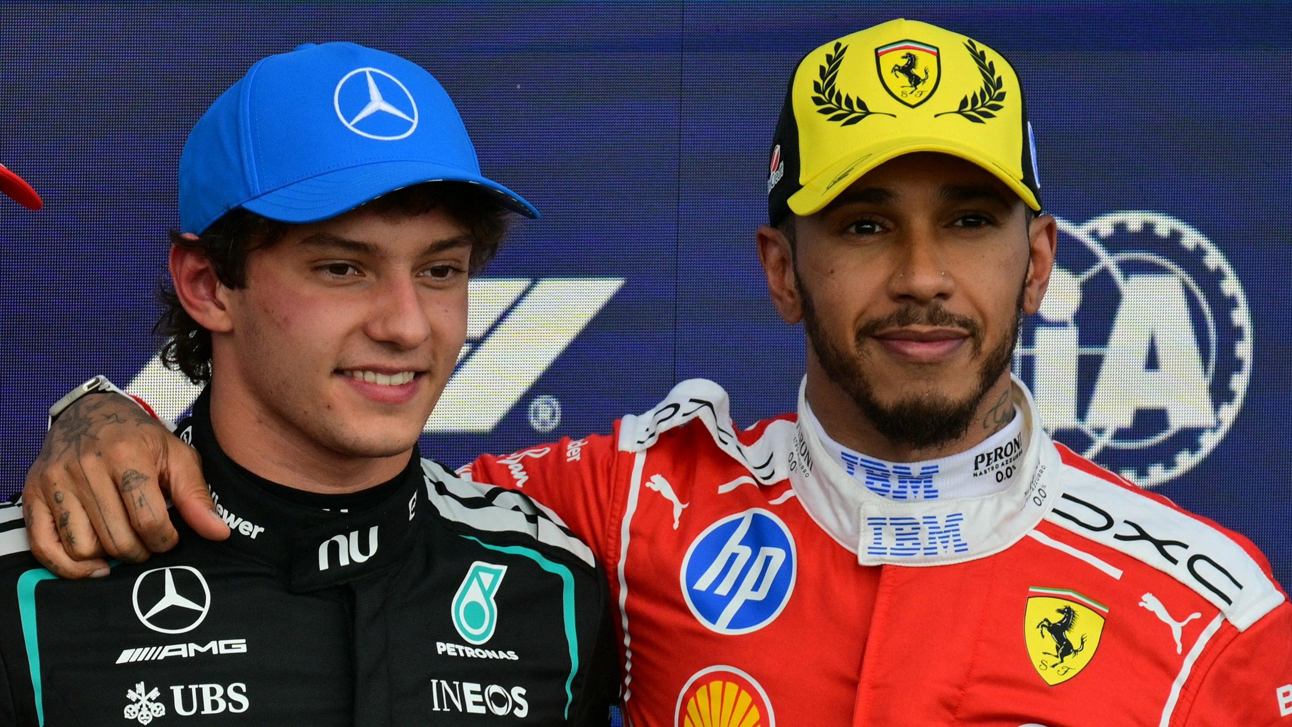 Lewis Hamilton with his arm around Kimi Antonelli's shoulder after qualifying for the British Grand Prix