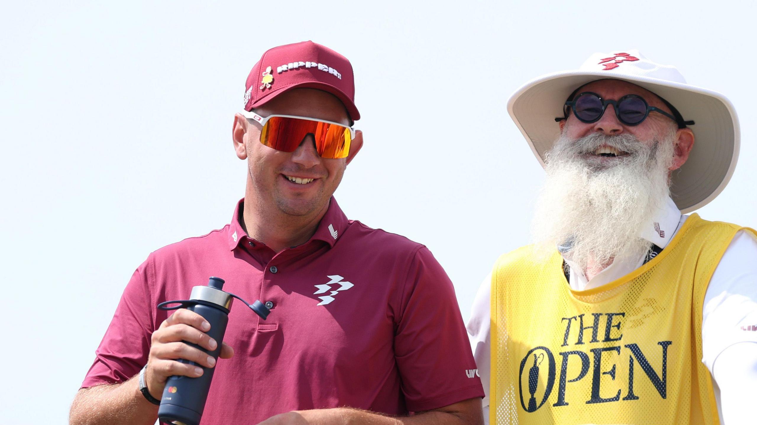 Lucas Herbert and caddie Nick Pugh laugh on the tee at Birkdale