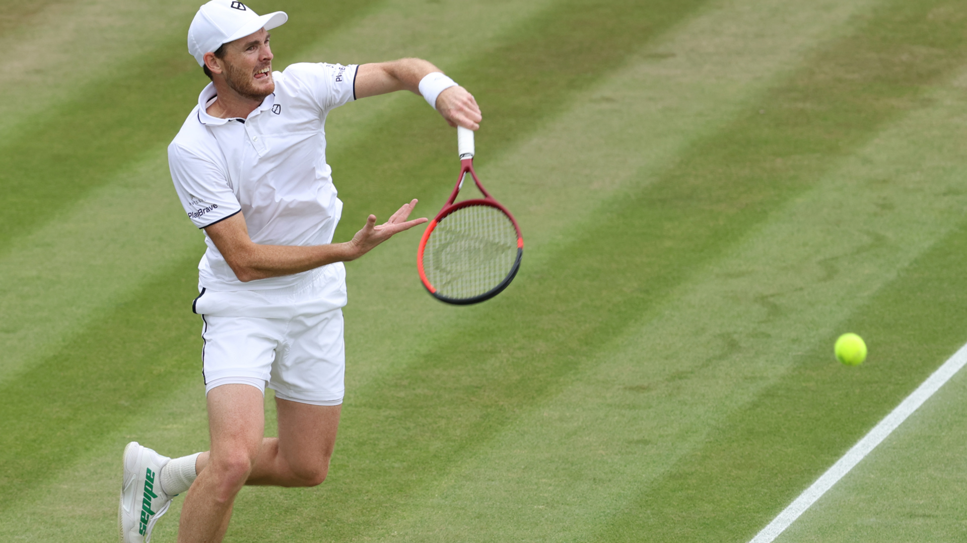 Jamie Murray hits the ball at Wimbledon