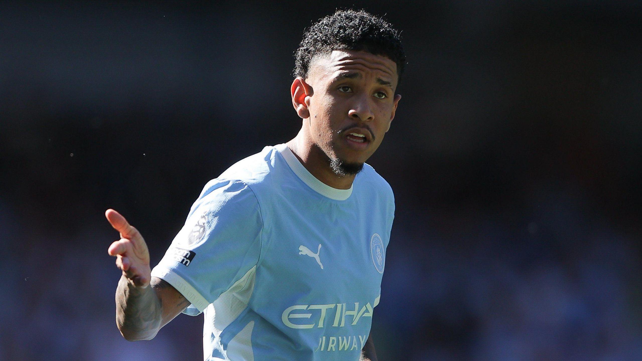 Manchester City winger Savinho gestures during a Premier League match