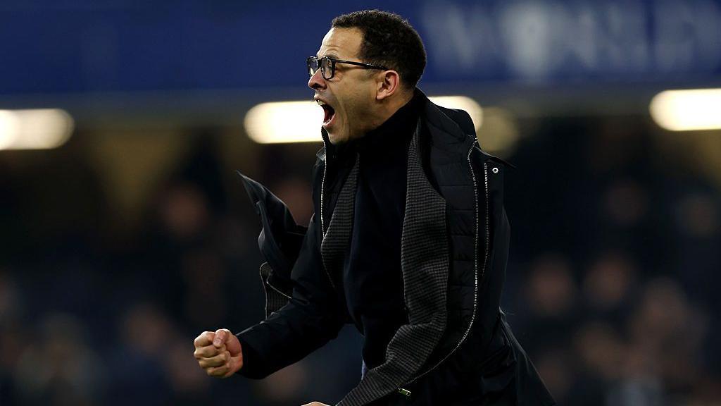 Liam Rosenior shouts and punches the air after Chelsea score