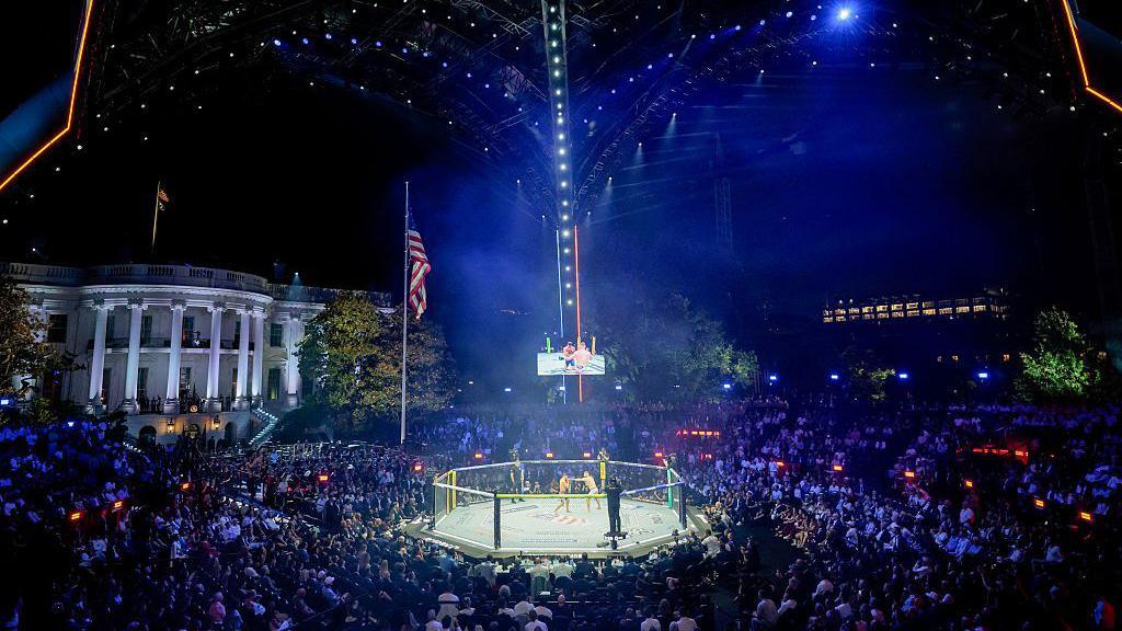 Justin Gaethje, mixed martial artist, and Ilia Topuria, mixed martial artist, during a lightweight championship bout during the UFC Freedom250 fight on the South Lawn of the White House in Washington, DC
