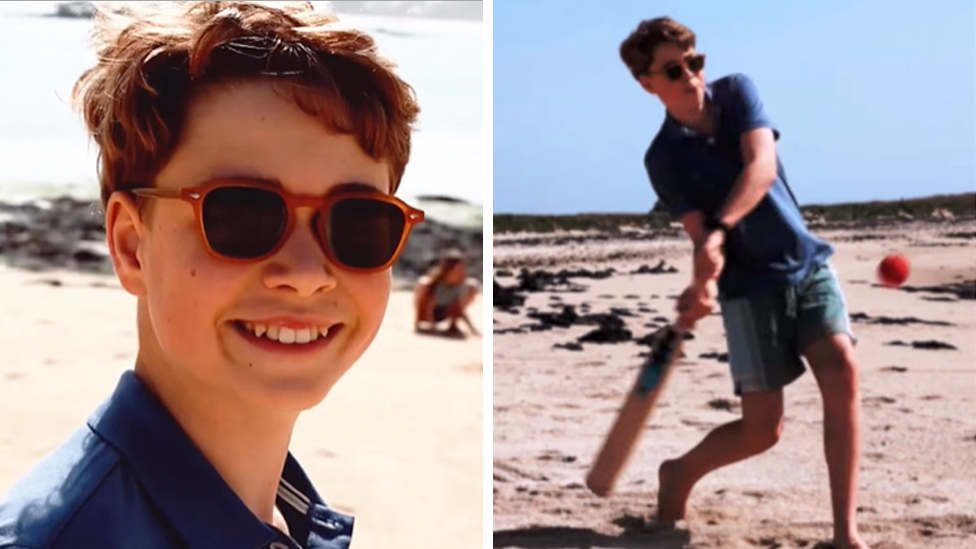 Composite image of screenshots from a video of Prince George on the beach in Cornwall. In the left image he is seen smiling at the camera while wearing a blue polo shirt and red sunglasses. In the right picture he is seen holding a cricket bat as a ball comes towards him