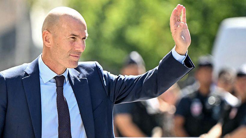 Zinedine Zidane waves to crowds after being unveiled as France manager