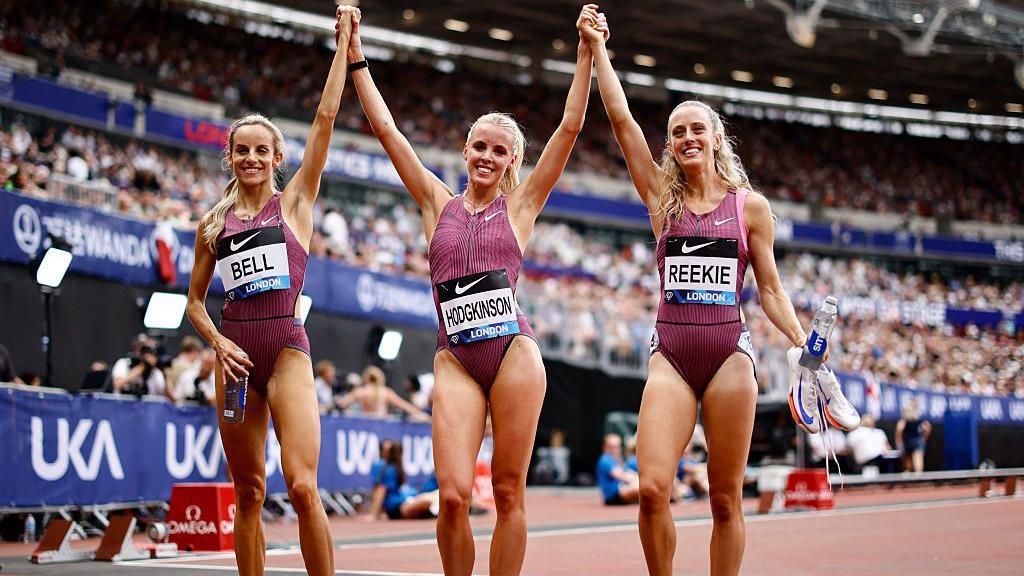 Britain's Keely Hodgkinson celebrates with Britain's Georgia Hunter-Bell and Britain's Jemma Reekie after the Women's 800m