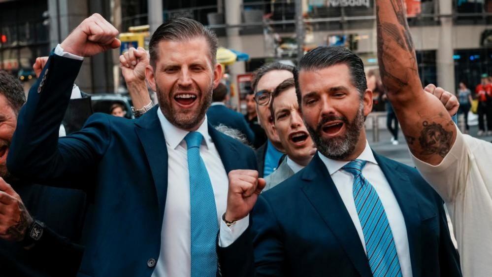 World Liberty Financial co-founders Donald Trump Jr (right) and Eric Trump outside the Nasdaq building last year