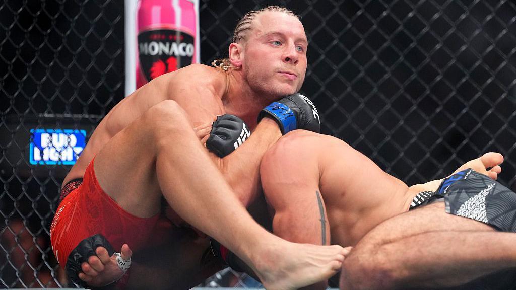Paddy Pimblett submits Benoit Saint-Denis with a guillotine choke