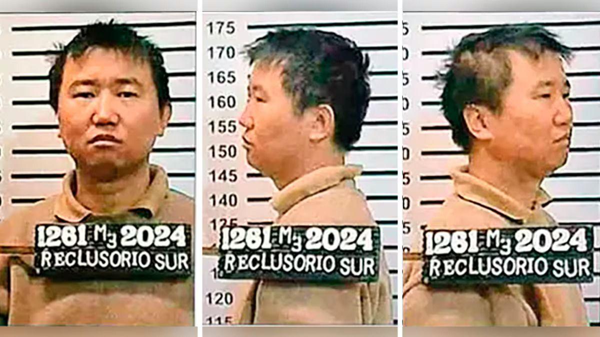 A police mugshot showing three images of Zhang Zhidong, one facing forward, one facing to the left and one facing to the right. He has short dark hair and is wearing a beige polo shirt. There are lines on the wall behind him indicating height. Zhang is about 175cm tall.