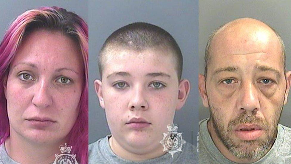 Mug shots of a woman with pink hair, a teenage boy and a balding man. They're in police custody wearing grey jumpers.