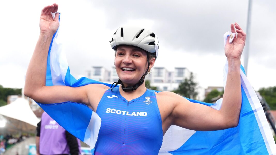 Scotland’s Woods wins gold again in restaged race Scotland’s Woods wins gold again in restaged race