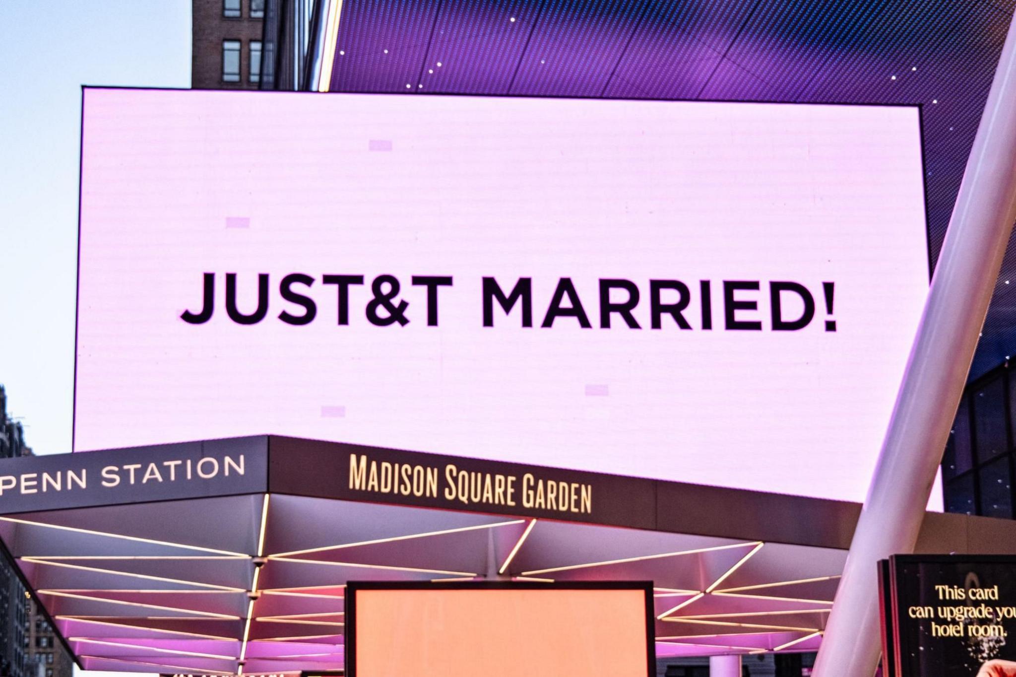 Madison Square Garden is lit in pink and displays a sign reading 'JUST&T MARRIED' during Taylor Swift and Travis Kelce's wedding celebration in New York, New York, USA, 3 July 2026.