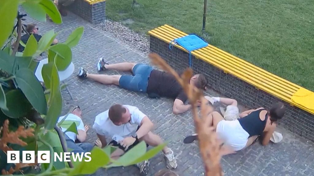 People flee as Russian strike hits near Ukraine coffee shop People flee as Russian strike hits near Ukraine coffee shop