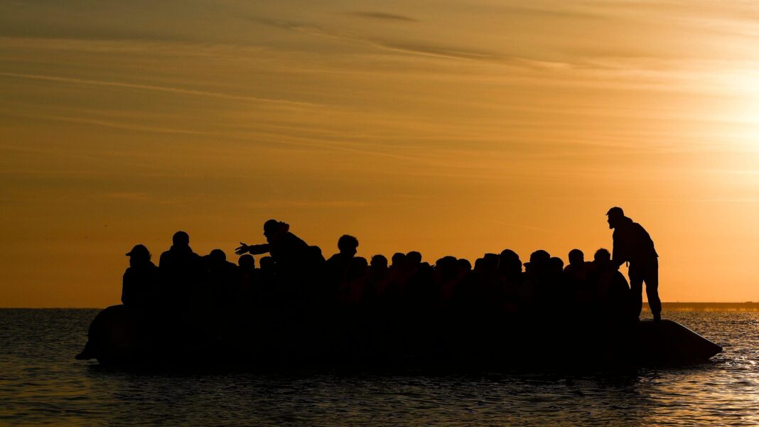 Record 128 people cross Channel in one small boat Record 128 people cross Channel in one small boat
