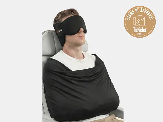Image may contain: Cushion, Home Decor, Furniture, Adult, Person, and VR Headset