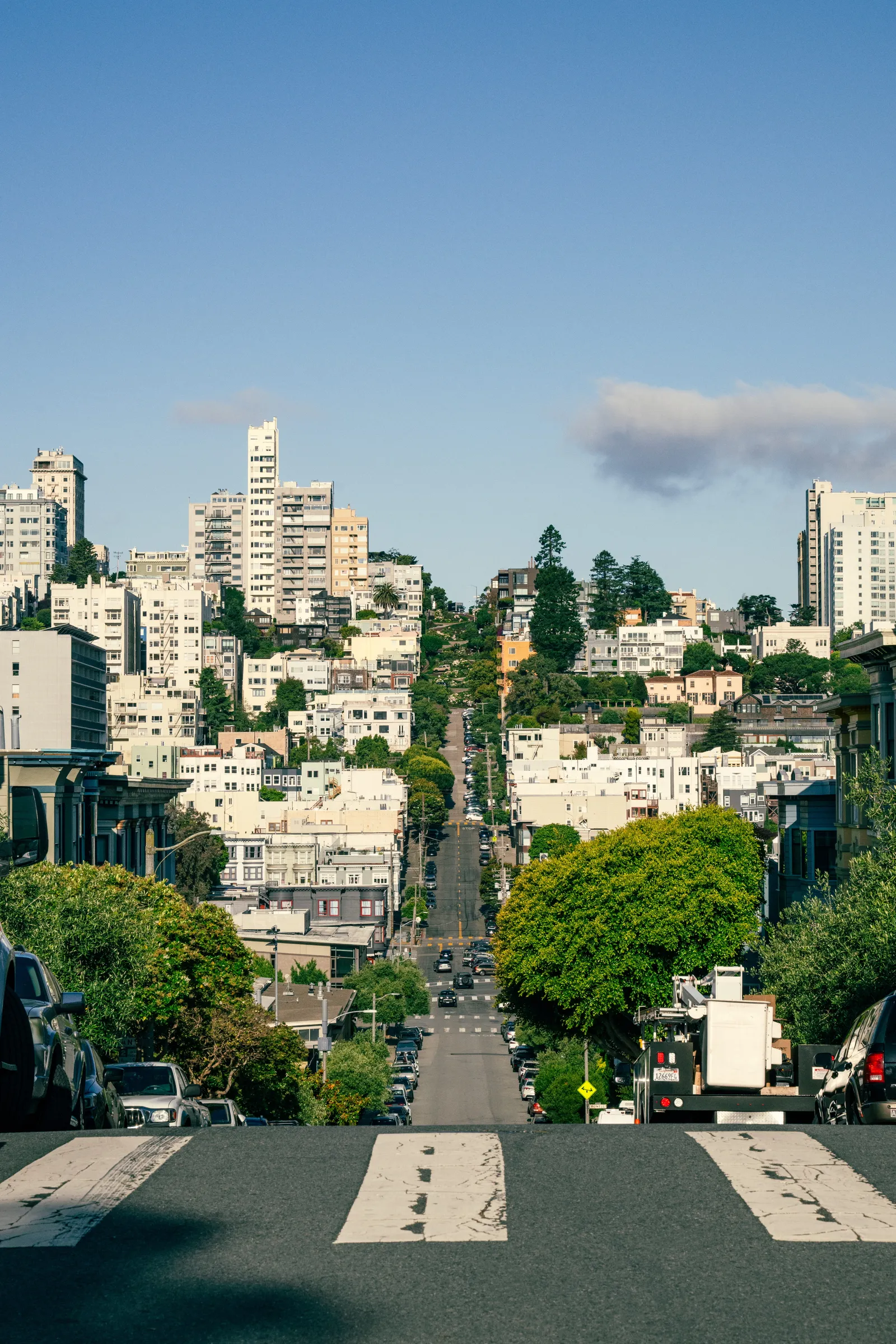 Image may contain Architecture Building City Cityscape Urban Neighborhood Road Street Metropolis Downtown and Car