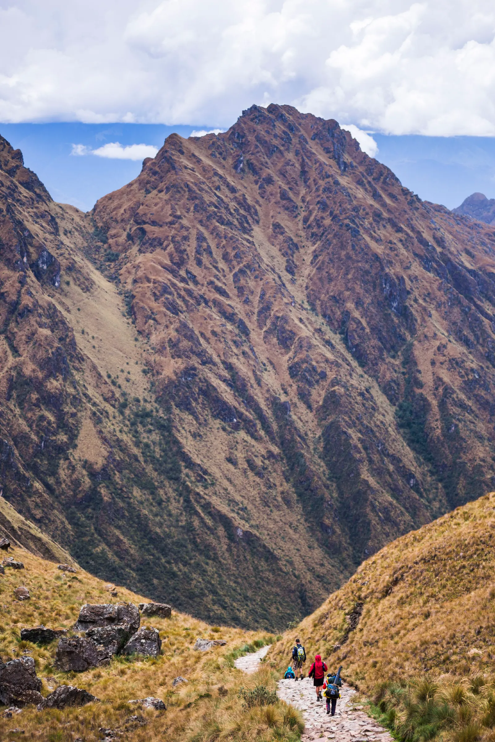 Image may contain Mountain Mountain Range Nature Outdoors Peak Slope Scenery Wilderness Valley Rock and Person