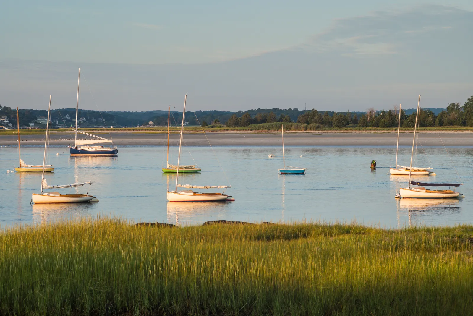 Image may contain Boat Sailboat Transportation Vehicle Nature Outdoors Scenery Watercraft Water Waterfront and Sky