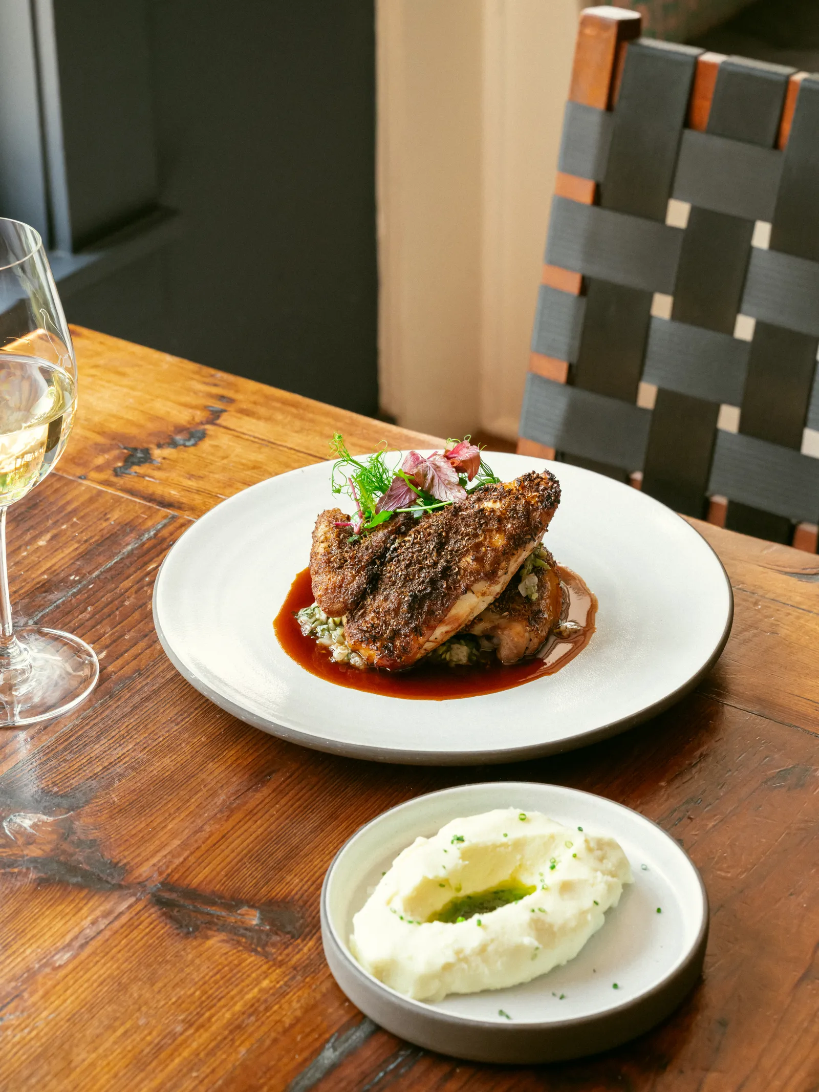 Image may contain Food Food Presentation Meat Pork Plate Meal Mutton and Glass