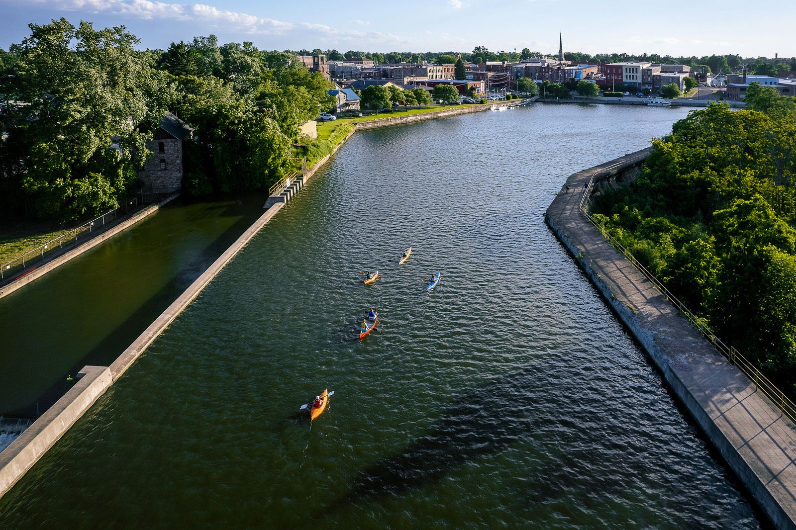 Image may contain Water Boat Canoe Canoeing Leisure Activities Person Rowboat Sport Transportation and Vehicle