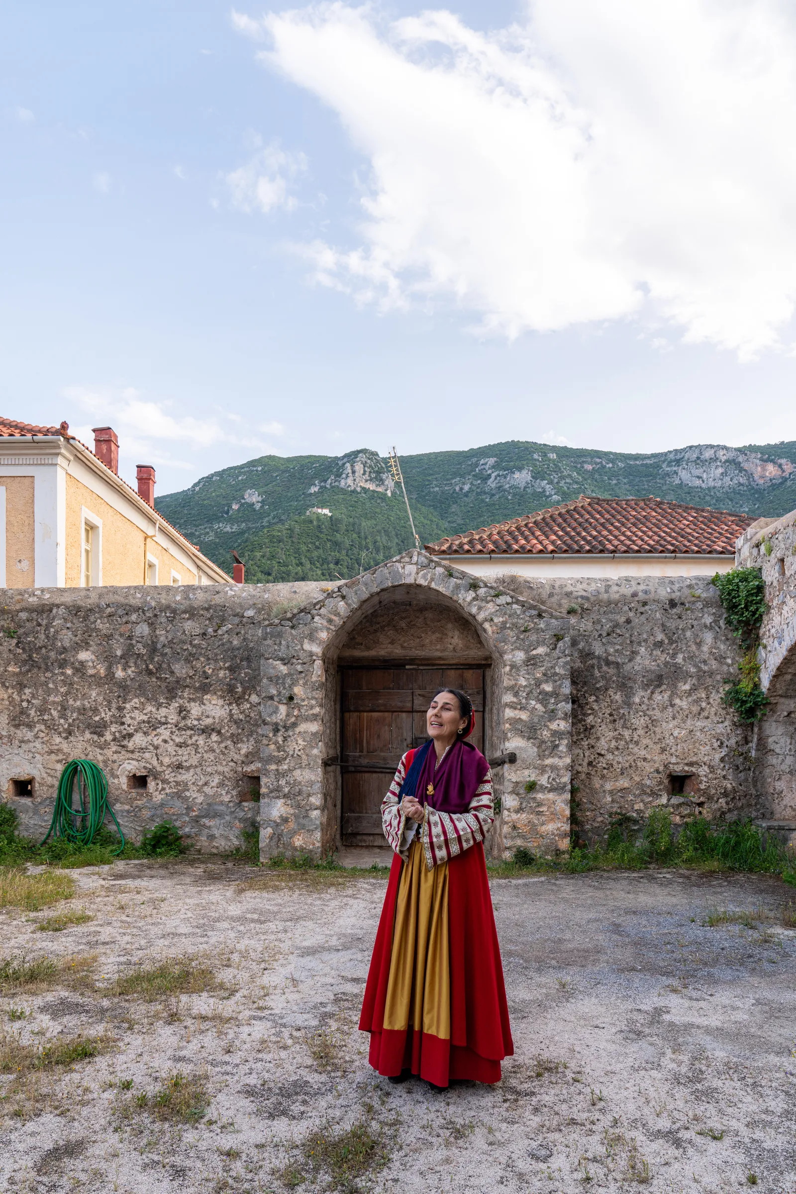 Image may contain Architecture Building Monastery Adult Person Countryside Nature Outdoors Rural and Village