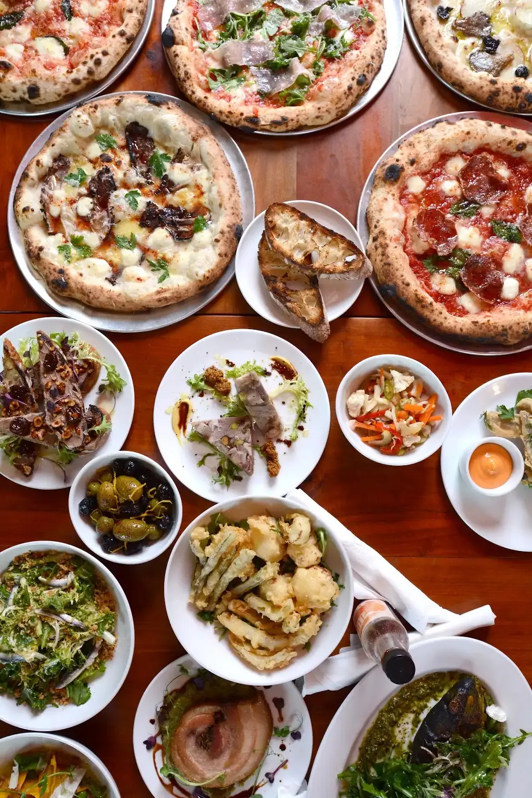 Image may contain Brunch Food Food Presentation Pizza Plate and Bread